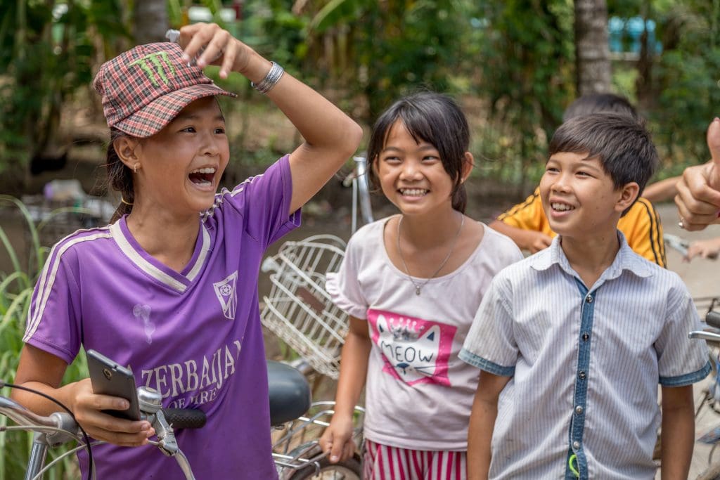 Mekong Delta Local Kids - VIETNAM & CAMBODIA - Ho Chi Minh City to Siem Reap itinerary with Mekong Cruise