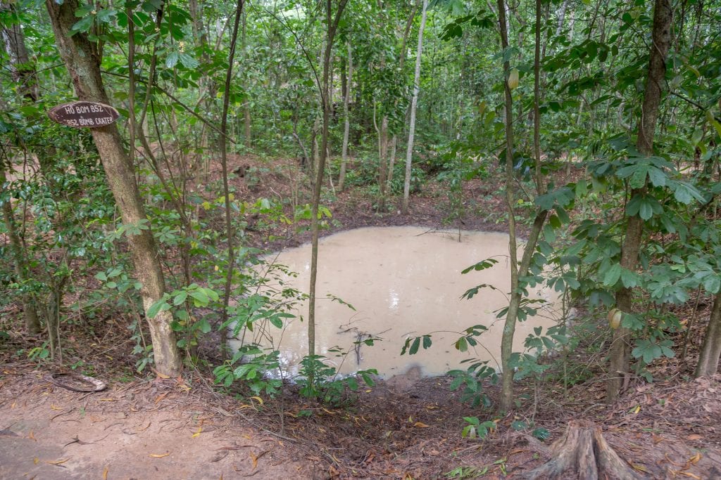 B52 Bomb Crater - VIETNAM - Must do day trip: Cu Chi tunnels and Cao Dai Temple from Ho Chi Min City
