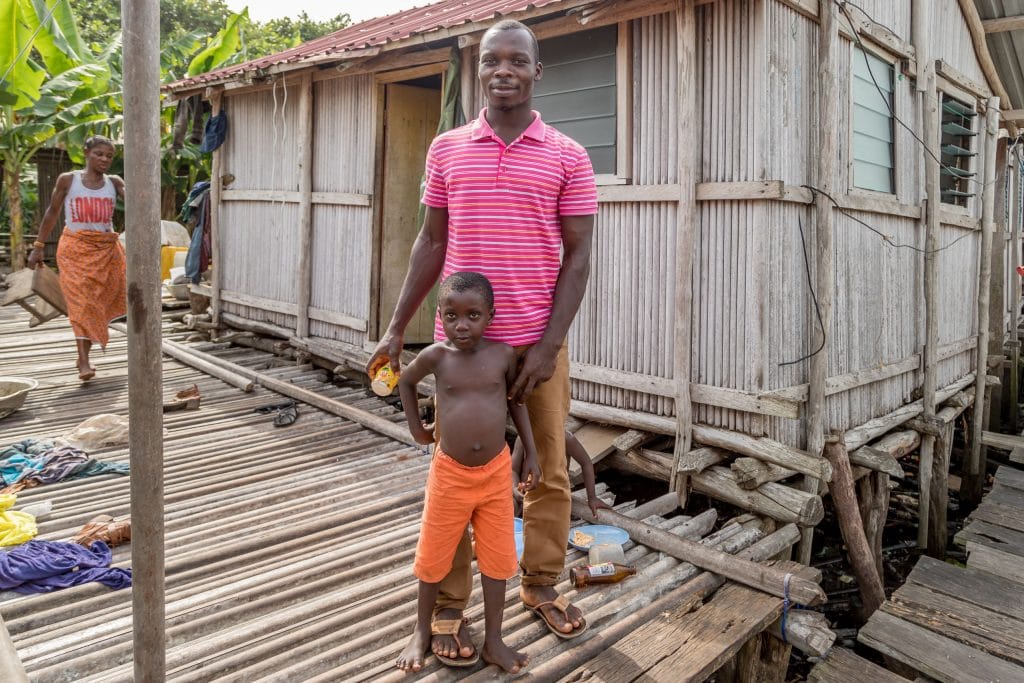 Fahter and son - GHANA - Stilt village Nzulezo on lake Tadane (Beyin); day trip from Takoradi