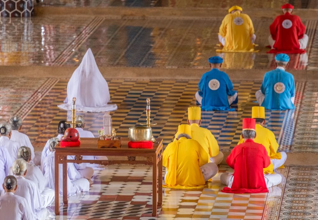 Red Blue Yellow Priests - VIETNAM - Must do day trip: Cu Chi tunnels and Cao Dai Temple from Ho Chi Min City