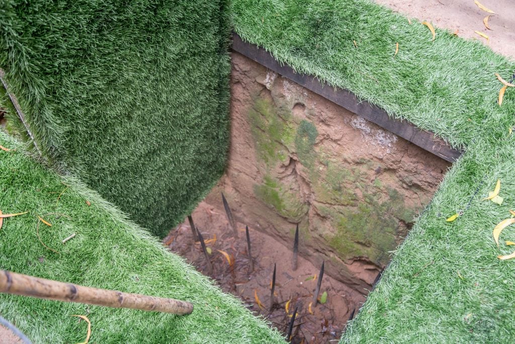 Solider Trap - VIETNAM - Must do day trip: Cu Chi tunnels and Cao Dai Temple from Ho Chi Min City