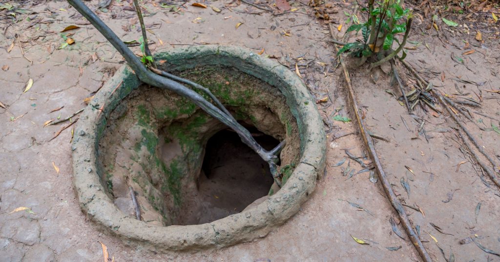 Tunnel Entrance - VIETNAM - Must do day trip: Cu Chi tunnels and Cao Dai Temple from Ho Chi Min City