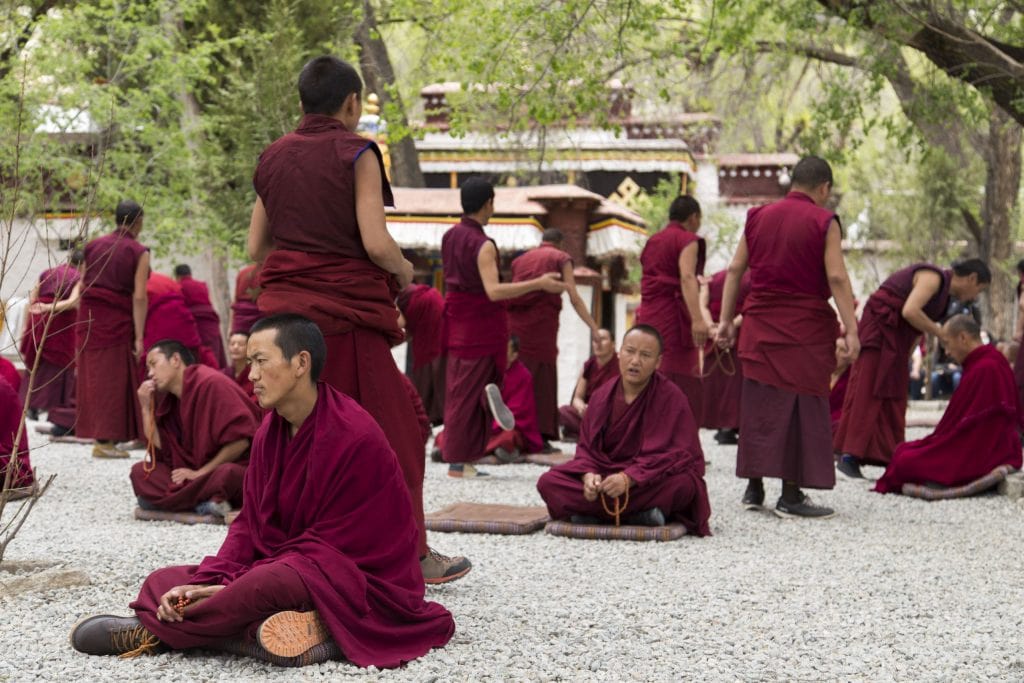 TIBET - Drepung and Sera monastery in Lhasa with monks debating