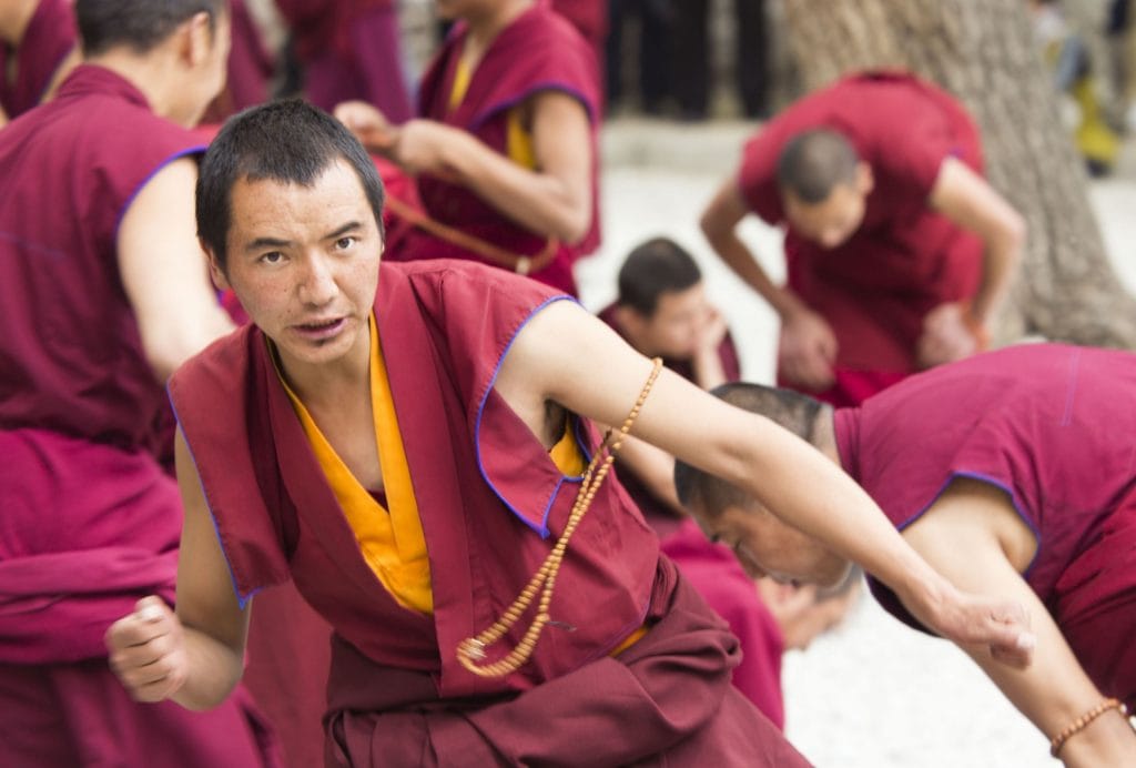 TIBET - Drepung and Sera monastery in Lhasa with monks debating